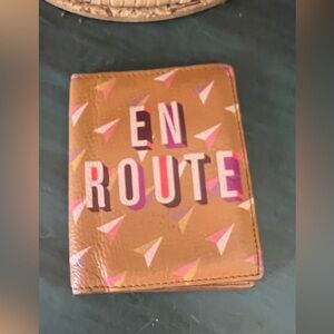 Fossil Travel RFID Passport Case in tan leather featuring a multi-color